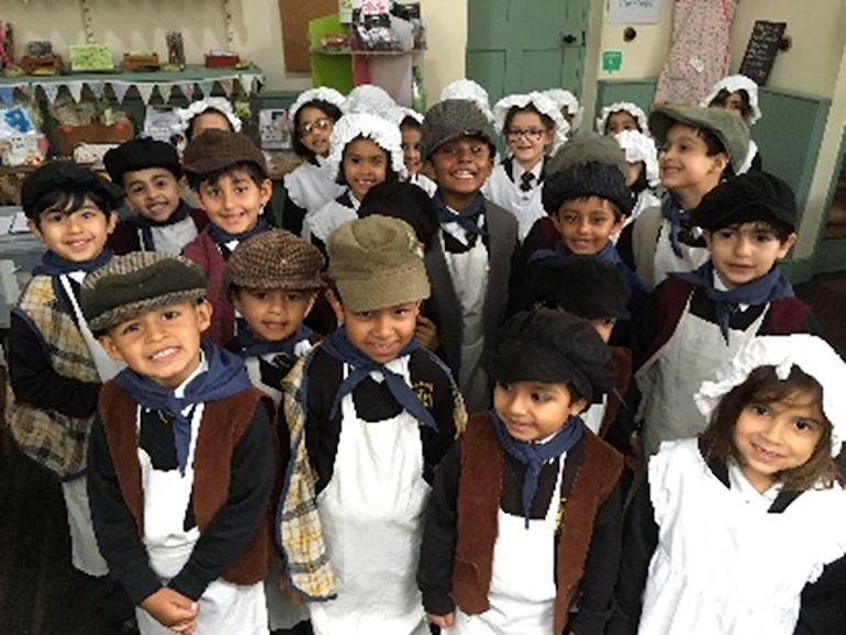 Children dressed up as Victorian workers